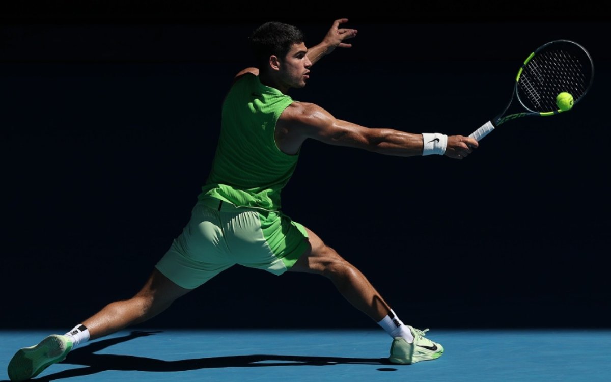 Alcaraz survives longest first set of his career at a major to move into Aus Open third round