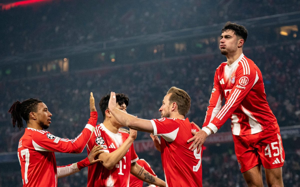 Kane's double sends Bayern through in Champions League