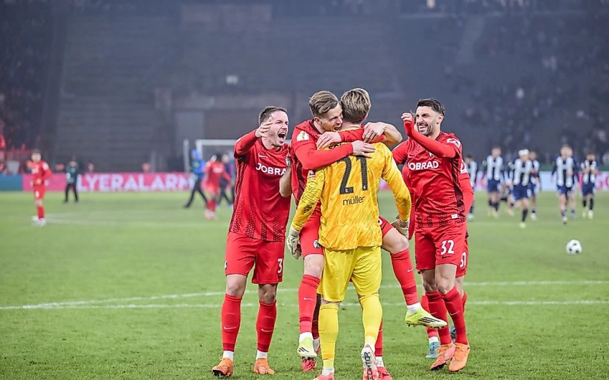 Freiburg advance to German Cup semis after shootout drama