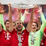 Kane treble powers Bayern in final-day Cologne clash